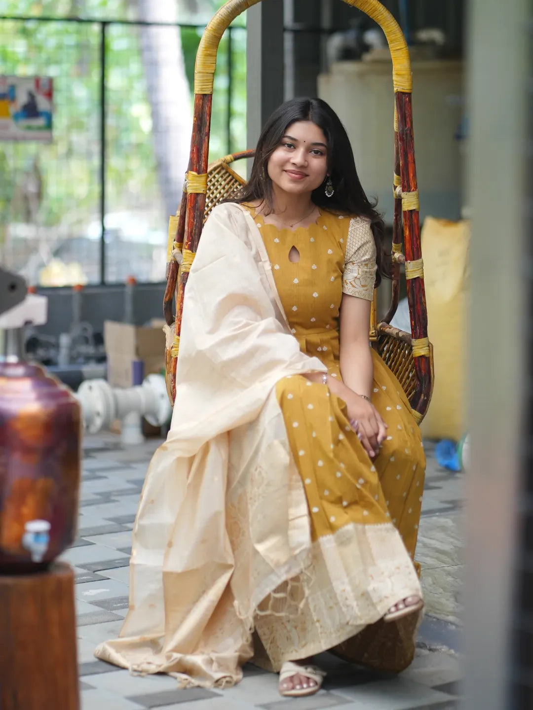 Mustard ethnic with a ivory soft zari weaved dupatta