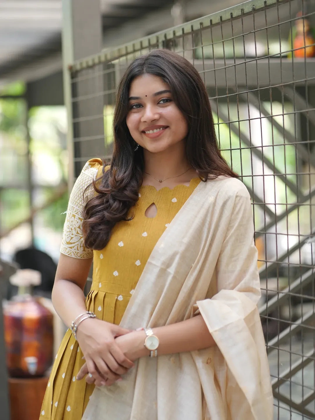 Mustard ethnic with a ivory soft zari weaved dupatta